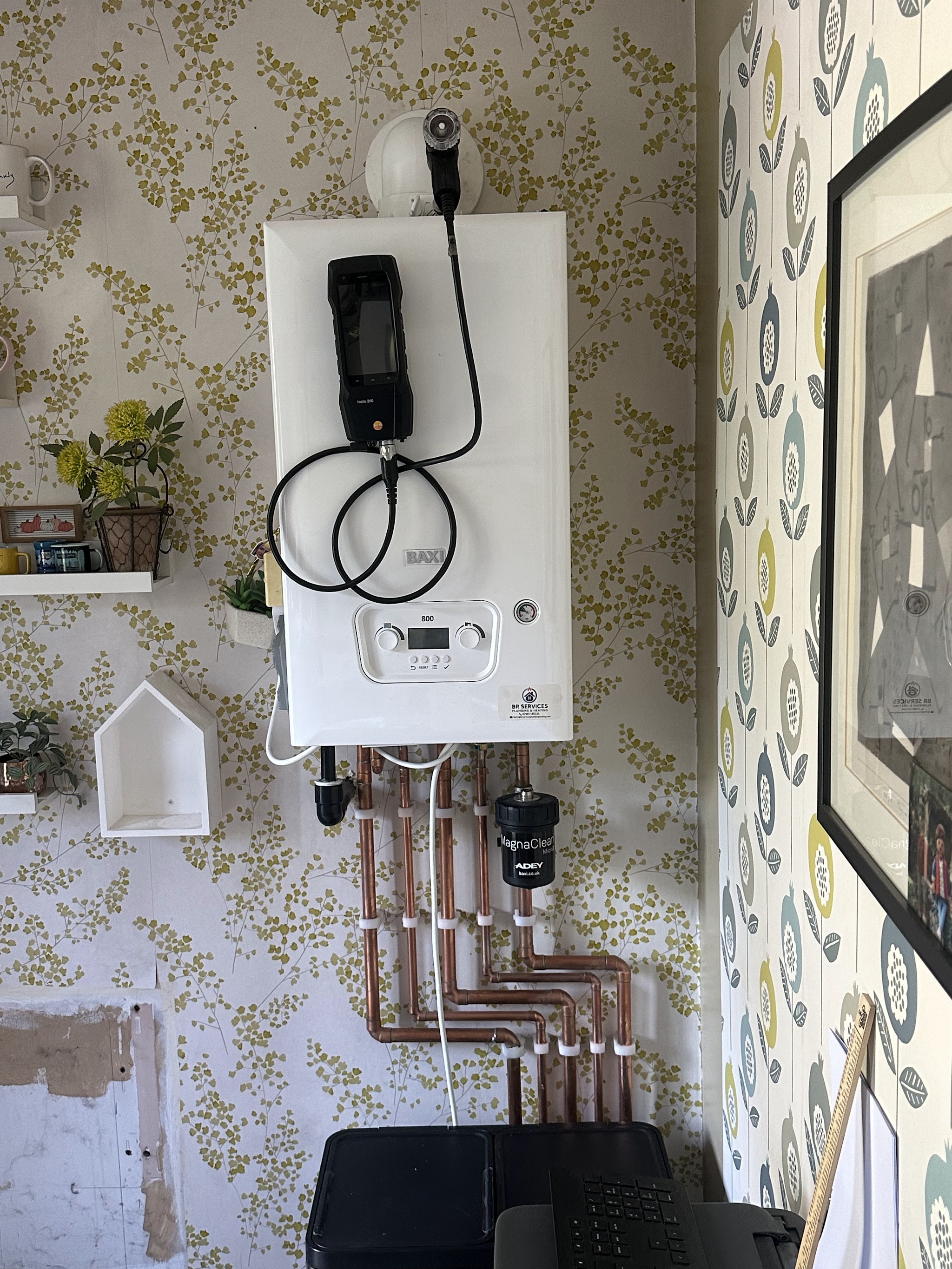 Domestic Baxi boiler with testing equipment attached
